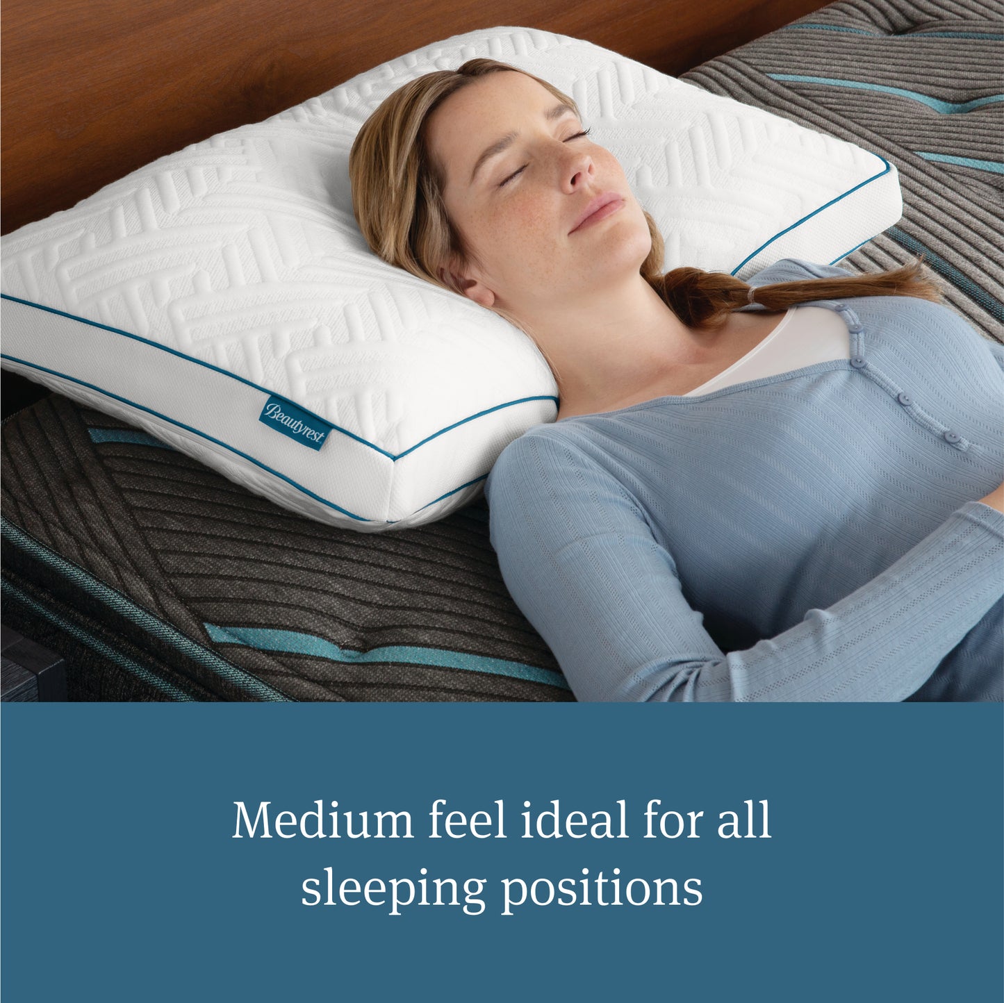 Woman laying on her back asleep with her head on a Beautyrest Down Alternative Pillow